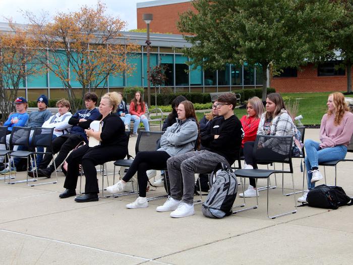 Those in attendance at the victimology event listen and silently reflect upon the testimonials being shared.