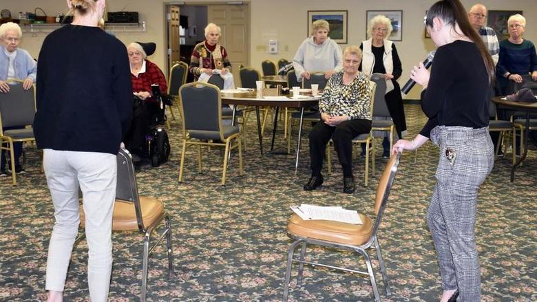 Students demonstrating exercises for balance